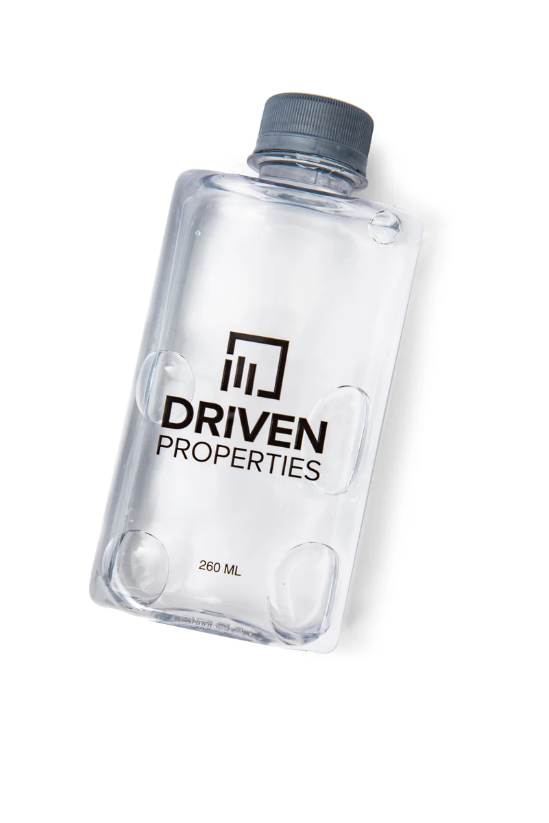 Custom-branded HarmonyX bottle example for Driven Properties