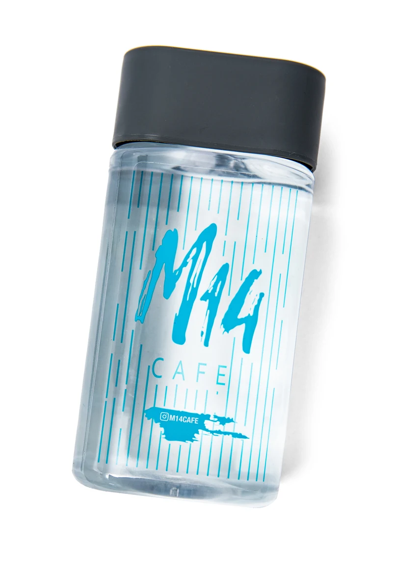 Custom-branded HarmonyX bottle example for M14 Cafe