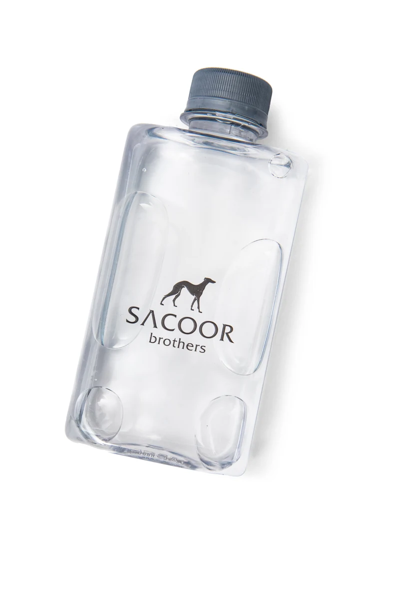 Custom-branded HarmonyX bottle example for Sacoor Brothers